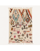 Tapis Beni Ouarain artisanal marocain en laine ivoire écru à motifs abstraits multicolores