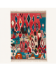 Tapis Beni Ouarain artisanal marocain en laine rouge corail framboise et bleu turquoise à motifs géométriques
