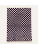 Tapis Beni Ouarain artisanal marocain en laine indigo profond, ivoire naturel et crème, motif géométrique en damier