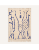 Tapis Beni Ouarain artisanal marocain en laine ivoire écru et bleu profond