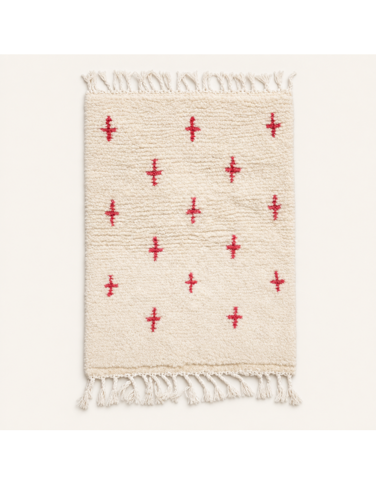 Tapis Beni Ouarain artisanal marocain en laine ivoire à motifs géométriques rouges
