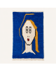 Tapis Beni Ouarain artisanal marocain en laine bleu cobalt et ivoire avec portrait central