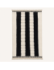 Tapis Beni Ouarain artisanal marocain en laine ivoire crème et noir charbon à rayures verticales