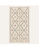 Tapis Beni Ouarain artisanal marocain en laine ivoire blanc cassé et noir à motif géométrique