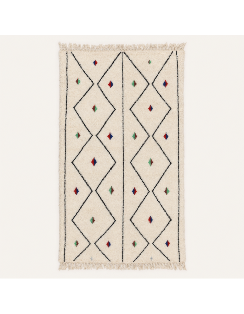 Tapis Beni Ouarain artisanal marocain en laine ivoire blanc cassé et noir à motif géométrique