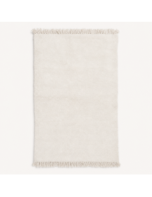 Tapis Beni Ouarain artisanal marocain en laine ivoire blanc chaud, rectangulaire et uni