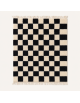 Tapis Beni Ouarain artisanal marocain en laine écru ivoire et noir charbon à motif damier