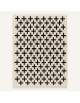 Tapis Beni Ouarain artisanal marocain en laine ivoire écru à motif géométrique noir
