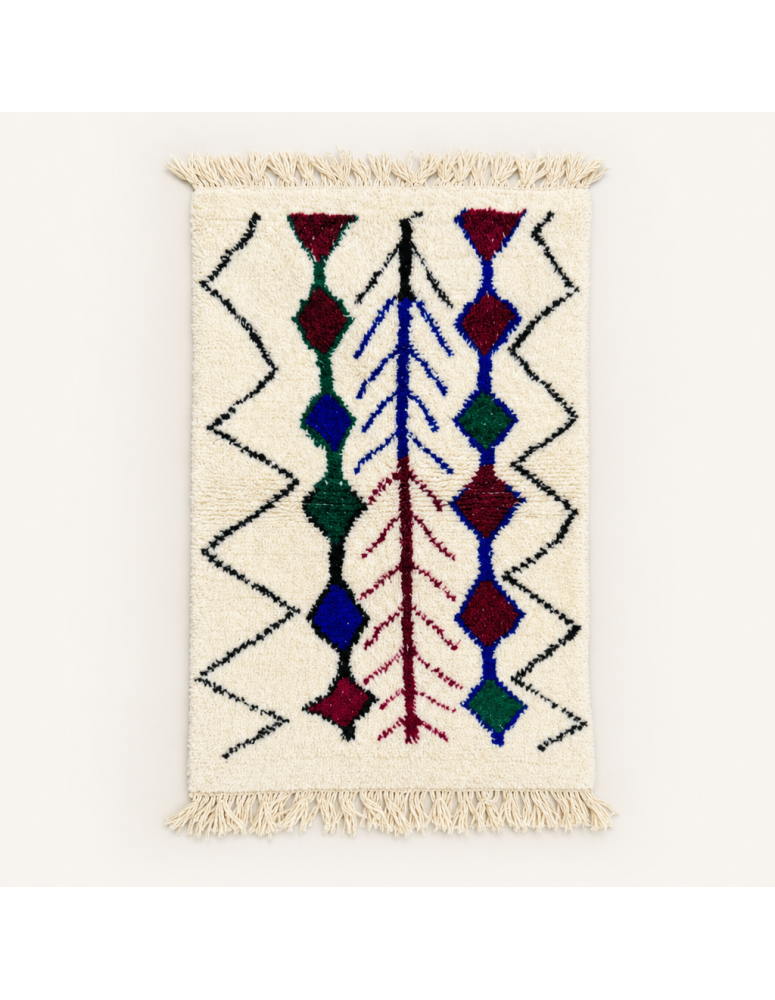 Tapis Beni Ouarain artisanal marocain en laine ivoire crème et noir à motifs botaniques et géométriques