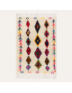 Tapis Beni Ouarain artisanal marocain en laine ivoire à motifs berbères multicolores