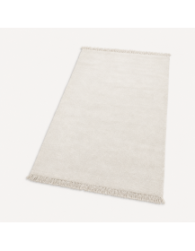Vue rapprochée du tapis Beni Ouarain ivoire révélant sa texture dense et légèrement duveteuse