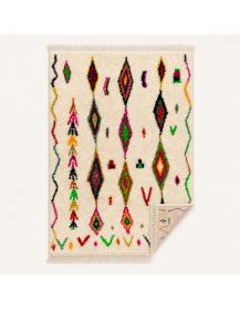 Tapis Beni Ouarain ivoire et multicolore présenté sur sa face avant, revers non visible