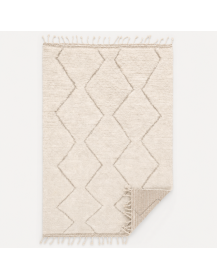 Tapis Beni Ouarain ivoire crème présenté côté revers
