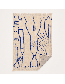 Tapis artisanal marocain rectangulaire ivoire écru et bleu profond vu au dos