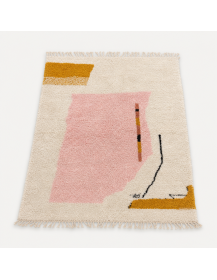 Vue en perspective d’un tapis Beni Ouarain abstrait en laine, avec franges écrues et composition asymétrique