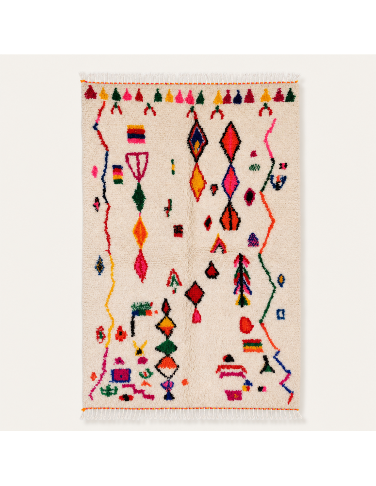 Tapis Beni Ouarain artisanal marocain en laine ivoire à motifs berbères multicolores