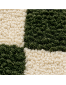 Détail de la texture dense et bouclée en laine d’un tapis Beni Ouarain à relief