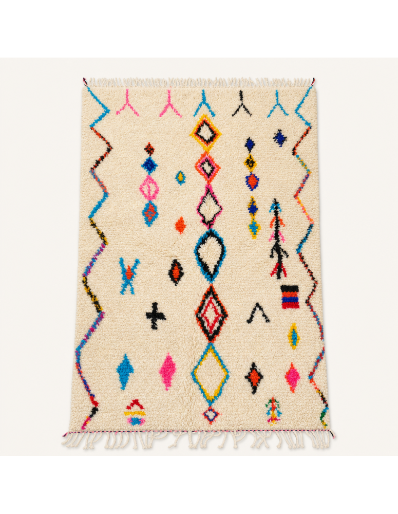Tapis Beni Ouarain artisanal marocain en laine ivoire crème avec motifs géométriques multicolores
