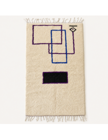 Tapis Beni Ouarain artisanal marocain en laine ivoire crème à motif géométrique noir violet et bleu