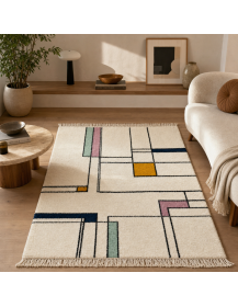Tapis Beni Ouarain géométrique ivoire et noir dans un intérieur contemporain aux matières naturelles