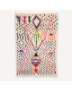 Tapis Beni Ouarain artisanal marocain en laine ivoire écru et noir à motifs géométriques colorés