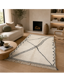 Tapis Beni Ouarain ivoire et charbon dans un intérieur contemporain aux matières naturelles