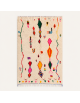 Tapis Beni Ouarain artisanal marocain en laine écrue avec motifs berbères abstraits multicolores