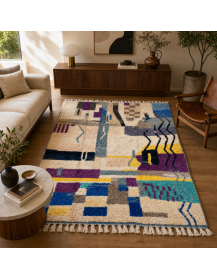 Tapis Beni Ouarain abstrait en laine ivoire crème et bleu cobalt dans un salon contemporain