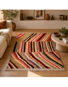 Tapis Beni Ouarain terracotta et noir dans un intérieur bohème chaleureux