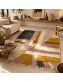Tapis Beni Ouarain ivoire crème et charbon dans un intérieur contemporain aux matières naturelles