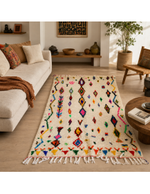 Tapis Beni Ouarain ivoire crème et multicolore dans un intérieur chaleureux et bohème