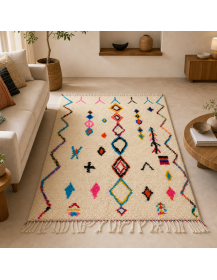 Tapis Beni Ouarain ivoire crème et turquoise dans un intérieur contemporain chaleureux aux accents bohèmes